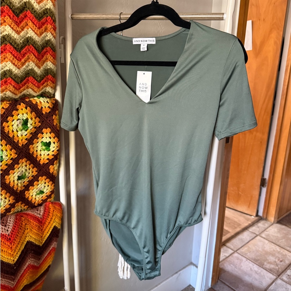 And Now This bodysuit